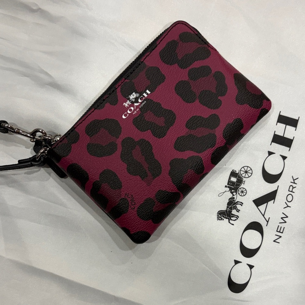 COACH pink and Black Leopard Print Leather Wristlet